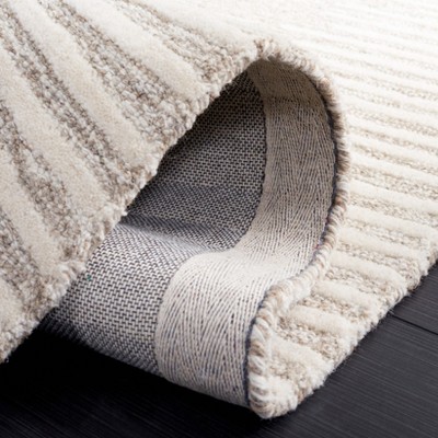 Natural Ivory Handmade Wool Tufted Abstract Rug 5' x 8'