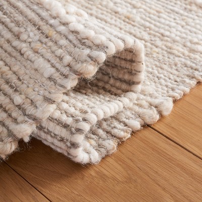 Ivory and Beige Handwoven Wool Area Rug with Fringe, 3' x 5'