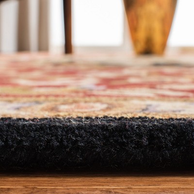 Handmade Round Red and Black Wool Tufted Rug