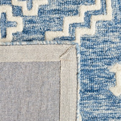 Handmade Blue and Ivory Tufted Wool Round Rug