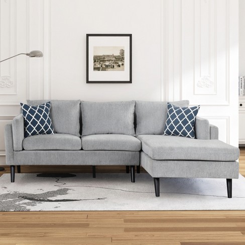 Sectional couch shop with attached cushions