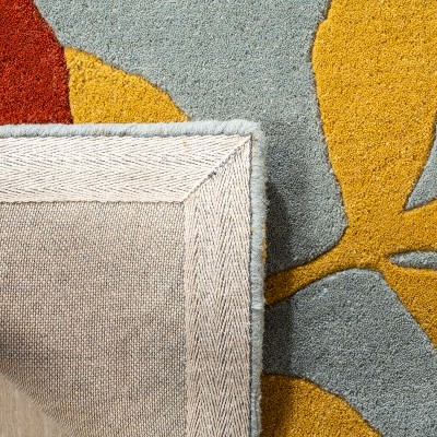 Handmade Tufted Blue and Multicolor Wool Area Rug