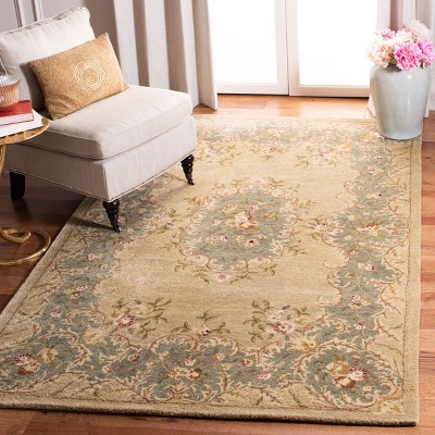 Ivory and Light Blue 6' x 9' Hand-Tufted Wool Area Rug