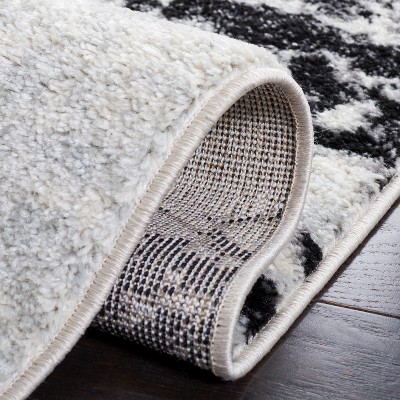 Ivory Boho-Chic Hand-Knotted Synthetic Area Rug