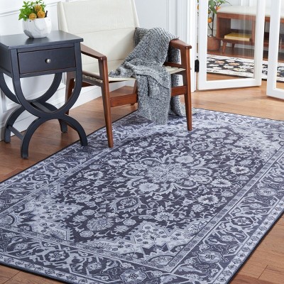 Tucson Black and Beige Synthetic 5' x 8' Washable Area Rug