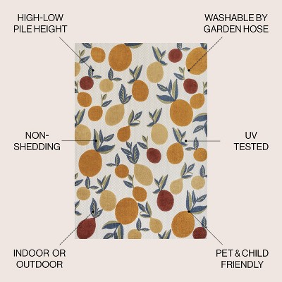 4' x 6' Ivory and Orange Floral Synthetic Area Rug