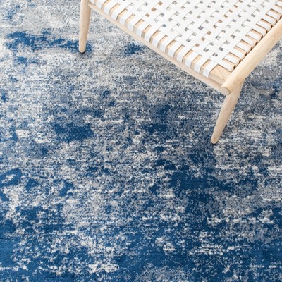 Grey and Navy Abstract 8' x 10' Synthetic Area Rug