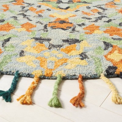 Handmade Blue Floral Wool Round Tufted Area Rug with Tassels
