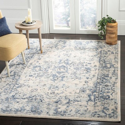 Ivory and Navy Rectangular Synthetic Area Rug