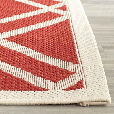 Red and Bone Geometric Synthetic Indoor/Outdoor Area Rug