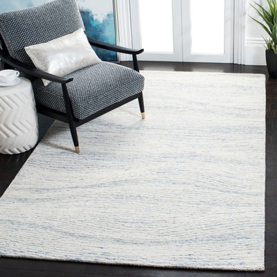 Light Blue Hand-Tufted Wool 6' x 9' Area Rug