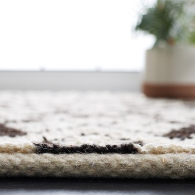 Hand-Knotted Black and Ivory Wool Area Rug, 5' x 8'