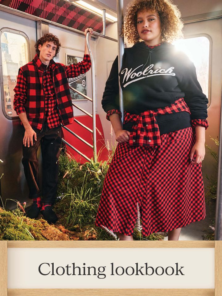 Clothing lookbook – 
image features man in red & black buffalo plaid shirt and vest and a woman in a black woolrich graphic sweatshirt with a red & black buffalo plaid skirt.