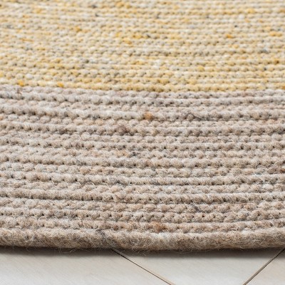 Handmade Gold and Beige Round Wool Braided Rug