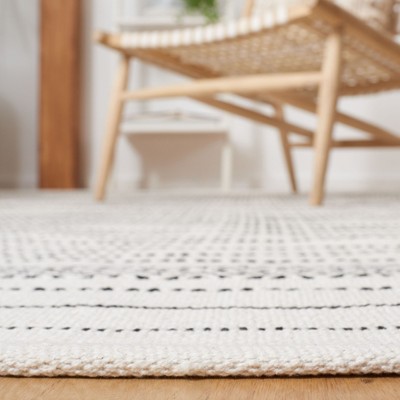 Ivory and Black Handwoven Wool Rectangular Area Rug, 6' x 9'