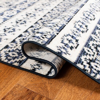 Ivory and Black 4' x 6' Hand-Knotted Oriental Rug