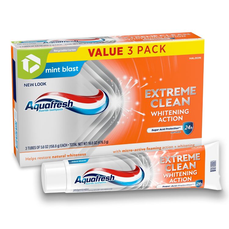 A box labeled "Aquafresh Extreme Clean Whitening Action" with a tube of toothpaste featuring the same branding and "mint blast" flavor.