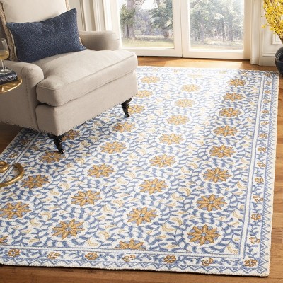 Ivory and Blue Floral Hand-Hooked Wool Area Rug