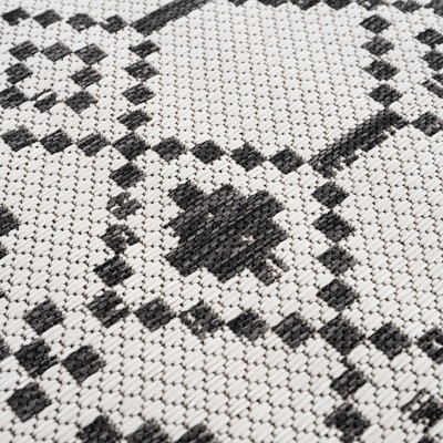 Haynesville Black and White Geometric Polypropylene Outdoor Rug