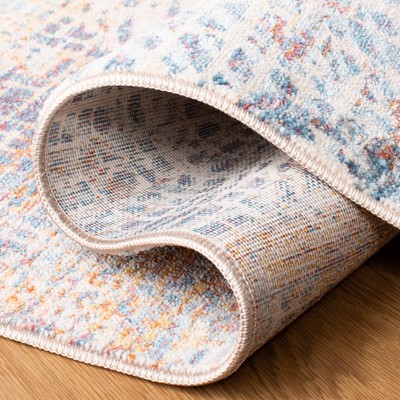 Vintage Blue and Rust Round Synthetic Area Rug