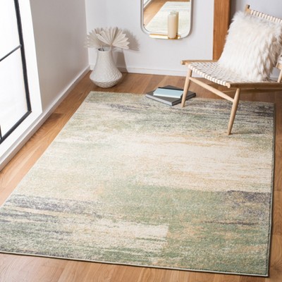 Ivory and Sage Abstract Round Synthetic Area Rug