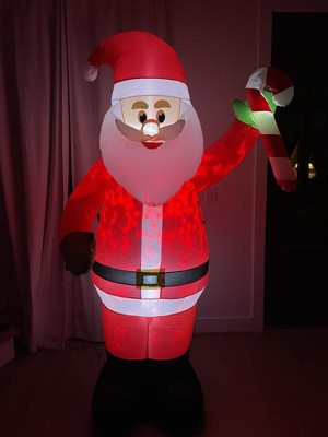 Occasions 7 Foot Inflatable Polyester Pre Lit Swirling Lights Santa With  Candy Cane Christmas Yard Decoration With Multicolor Lights : Target