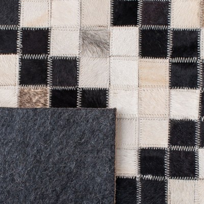 Handmade Black and Ivory Geometric Cowhide Area Rug