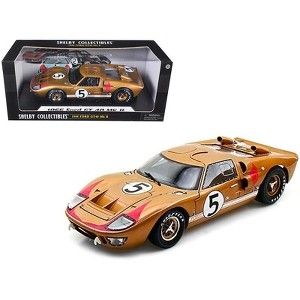 1966 Ford GT-40 MK II RHD (Right hand Drive) #5 Gold 24H of Le Mans 1/18 Diecast Model Car by Shelby Collectibles - 1 of 3