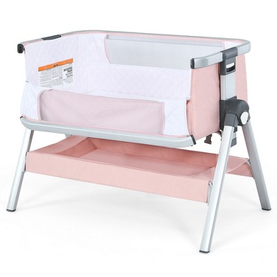 Image of Costway Baby Bassinet Bedside Sleeper w/Storage Basket & Wheel for Newborn Pink