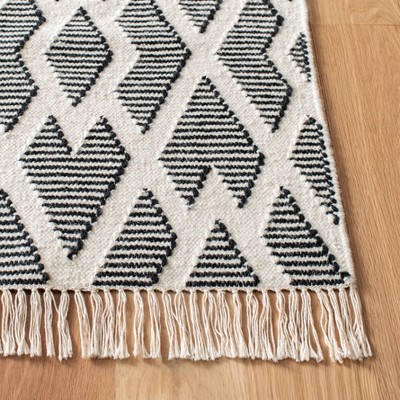 Nomadic Essence Handwoven Black and Cream Wool Area Rug, 5' x 8'