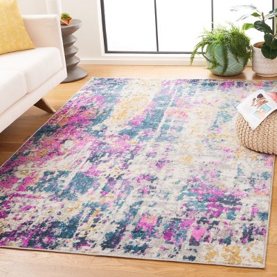 Ivory and Blue Abstract Synthetic Area Rug, 6' x 9'