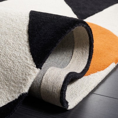 Handmade Black and Rust Geometric Wool Area Rug, 4 ft. x 6 ft.