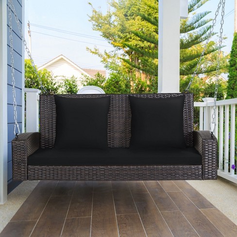 Black wicker store porch swing