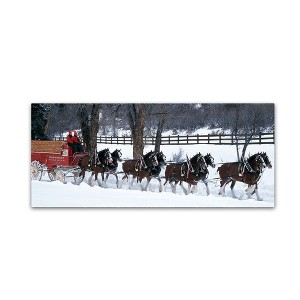 Trademark Fine Art -Clydesdales in Snow Covered Field w/ Fence- 14 x 32 Canvas - 1 of 1