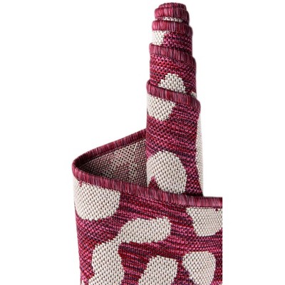 Magenta and White Synthetic 4' x 6' Outdoor Area Rug