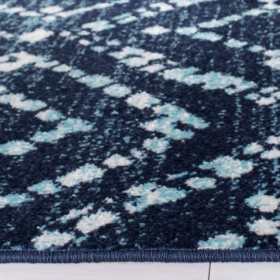 Navy and Ivory Geometric 4' x 6' Synthetic Area Rug