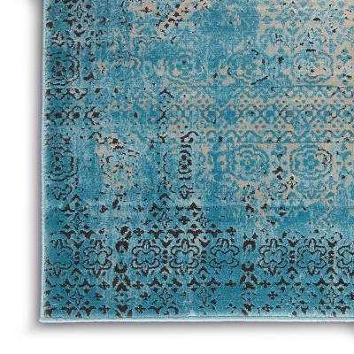 Blue 5' x 7' Stain-Resistant Synthetic Rectangular Area Rug