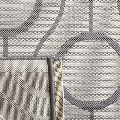 Elegant Reversible Gray Synthetic 4' x 5'7" Indoor/Outdoor Rug