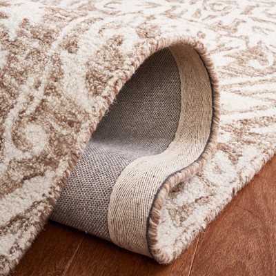 Ivory and Beige Abstract Wool 6' x 9' Handmade Tufted Rug
