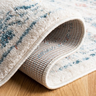 Ivory Rectangular 8' x 10' Stain-Resistant Synthetic Area Rug