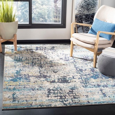 Madison Cream and Blue Abstract Round Synthetic Rug