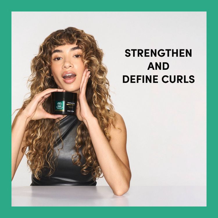A person with curly hair holds a black jar labeled "TRESemmé" with "STRENGTHEN AND DEFINE CURLS" text beside them.