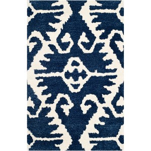 Wyndham WYD323 Hand Tufted Indoor Rugs - Safavieh - 1 of 4