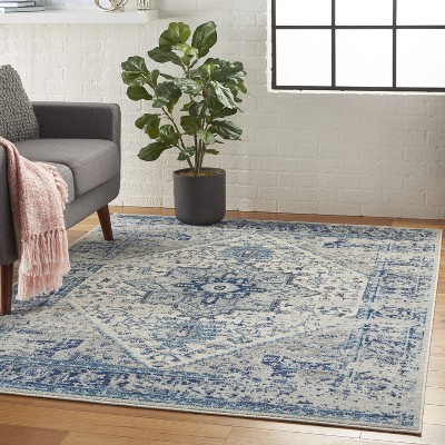 Ivory and Light Blue Synthetic 6' x 9' Easy Care Rug