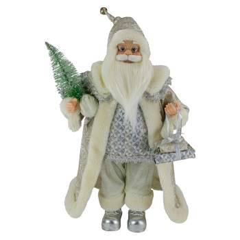Northlight 12" Ivory Standing Santa Christmas Figure Carrying a Green Pine Tree