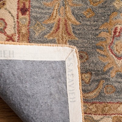 Ivory and Blue Hand Tufted Wool 4' x 6' Area Rug