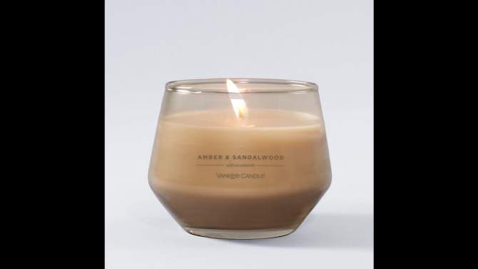 10oz Studio Glass Amber &#38; Sandalwood Candle Beige - Yankee Candle, 2 of 8, play video