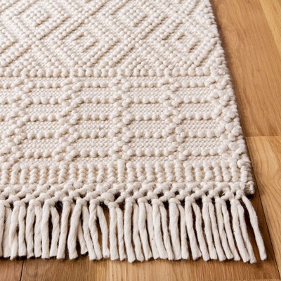 Ivory Coast Artisan Hand-Tufted Wool Rug - 5' x 8'