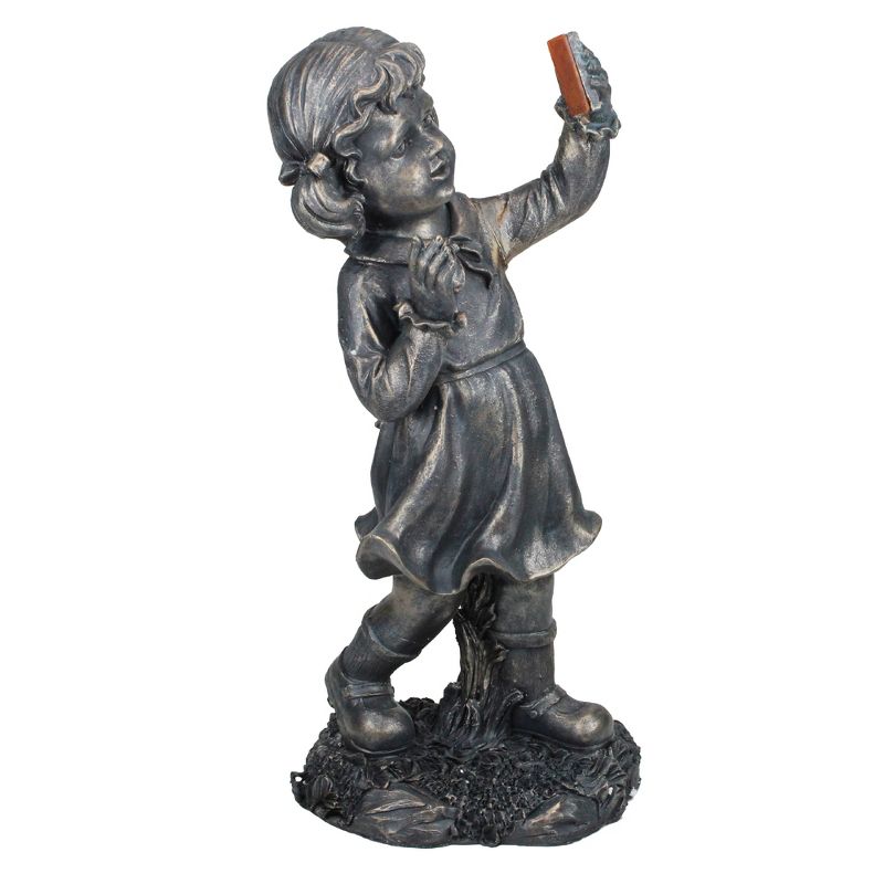 Northlight 18" Pre-Lit Black Solar Powered LED Girl with Cell Phone Outdoor Garden Statue, 1 of 4