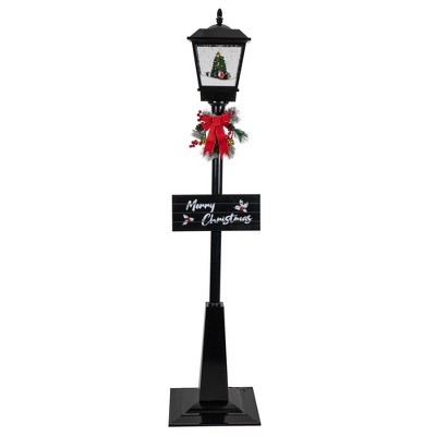 Northlight 70.75" Lighted Musical Snowing Santa and Friends Christmas Street Lamp